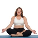 overweight women meditating for weight loss